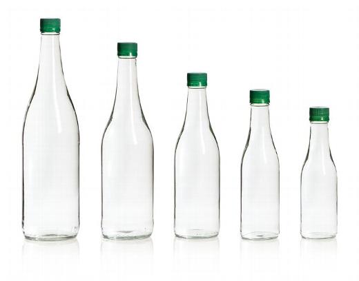 5 different sized glass bottles with green caps